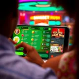 User engaging with Bangbet Sugar Rush on a digital device showing betting options and game interface